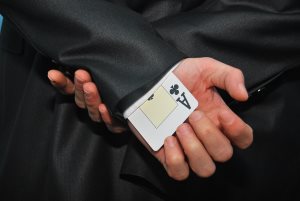 one ace card hidden in the sleeve for cheating purpose