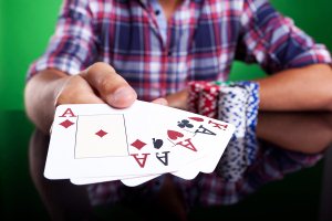 Cropped image of a winning four aces poker hand