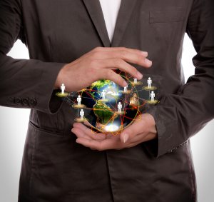Business man hold earth of social network