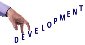 Male fingers climbing development word