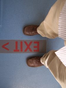 Two feet on exit sign
