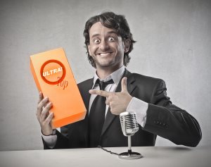 Smiling salesman advertising a product
