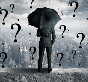 Concept of businessman with many questions and no answer Concept of businessman with many questions and no answer