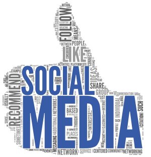 Social media concept in tag cloud of thumb up shape 