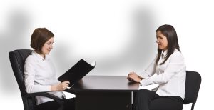 Two businesswomen at the interview in an office