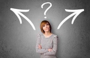 woman making a decision with arrows and question mark above her head