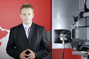 Television Presenter In Front Of Camera
