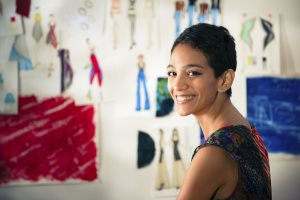 Young Woman Working As Fashion Designer