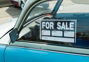 for sale sign on a vintage car