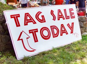 closeup of large tag sale sign at a local church sale