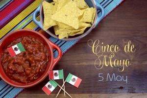 party table celebration with corn chips and salsa dip mexican flags 