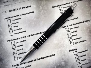 Pen laying on a customer satisfaction form