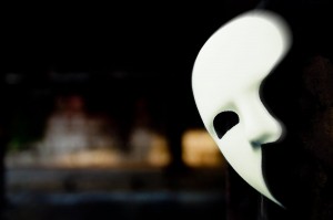 Phantom of the Opera Mask in Dark Tunnel
